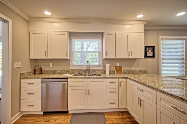 kitchen with dishwasher, light hardwood / wood-style flooring, sink, crown molding, and white cabinetry