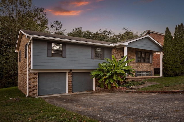 view of front of property featuring a garage