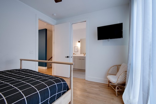 2809 Delaware Ave Unit 202, Nashville, TN 37209 - bedroom featuring light wood-style flooring, ensuite bath, and ceiling fan