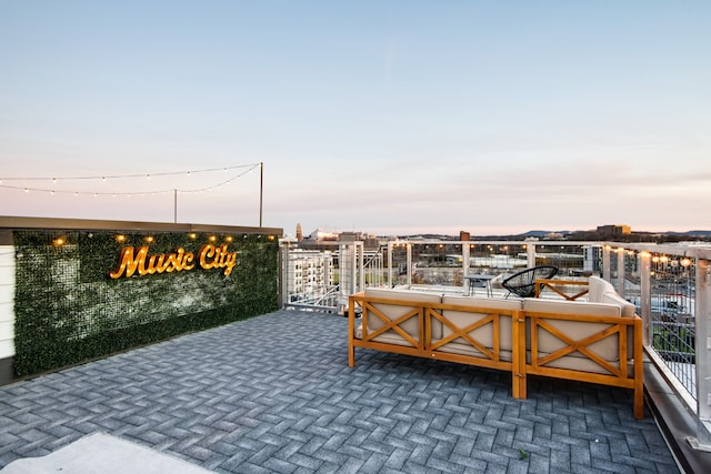 view of patio terrace at dusk