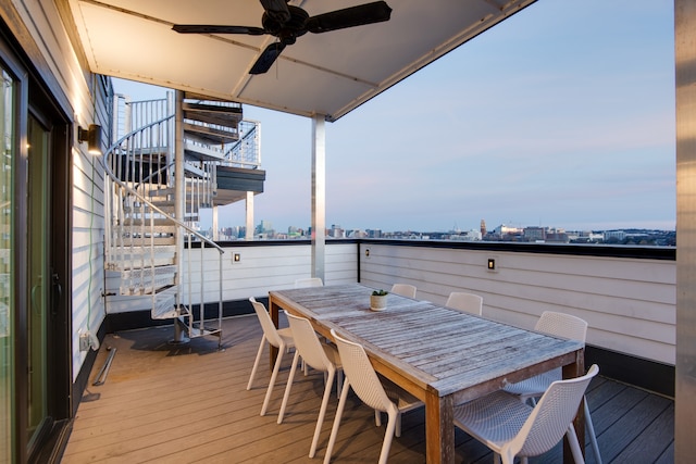 wooden deck with ceiling fan