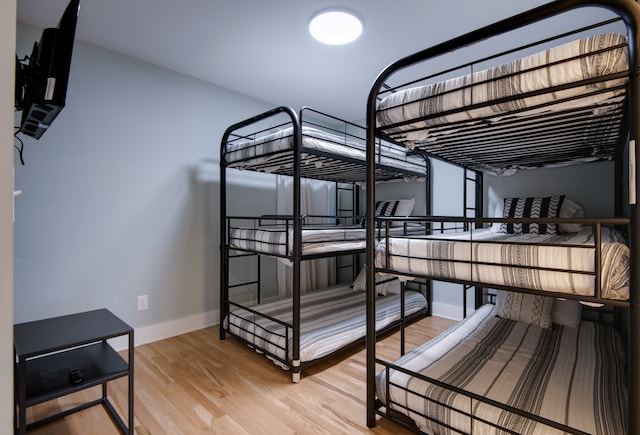 bedroom featuring hardwood / wood-style floors