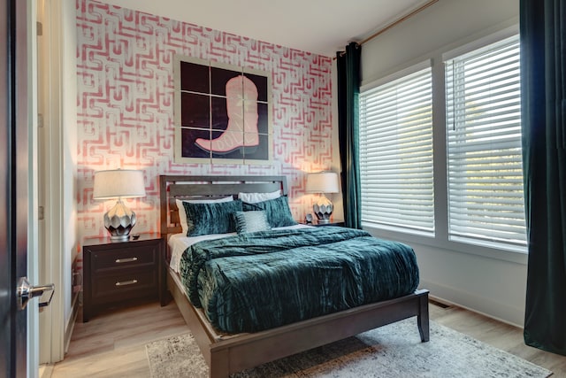 bedroom with light wood-type flooring