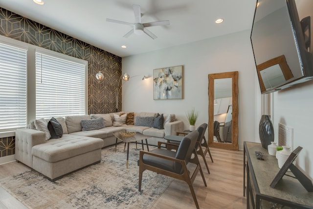 1112 Harmony Way, Nashville, TN 37207 - living area featuring wallpapered walls, ceiling fan, light wood finished floors, an accent wall, and recessed lighting