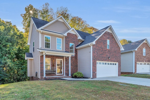 view of property featuring a front lawn and a garage