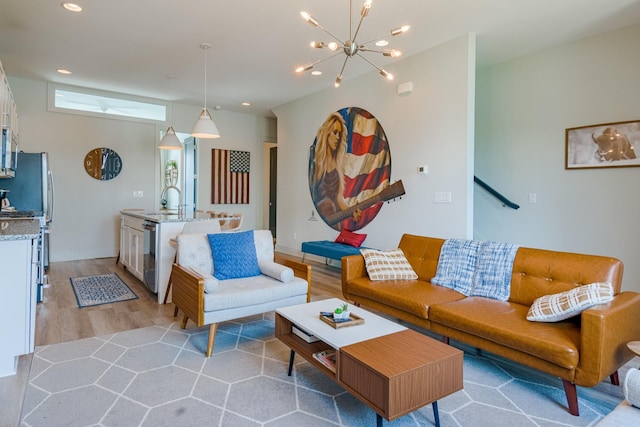 1149 Harmony Way, Nashville, TN 37207 - living room featuring light wood-type flooring, a chandelier, and recessed lighting
