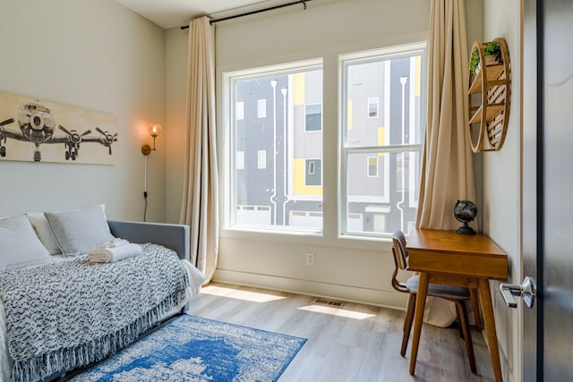 bedroom featuring light wood-type flooring