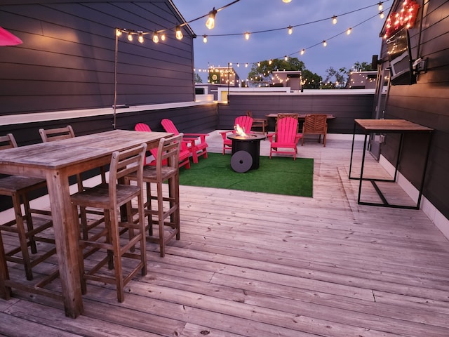 view of deck at dusk