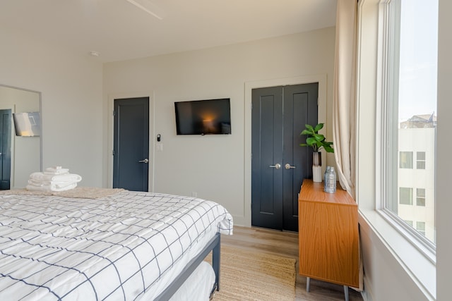 bedroom featuring light wood-type flooring