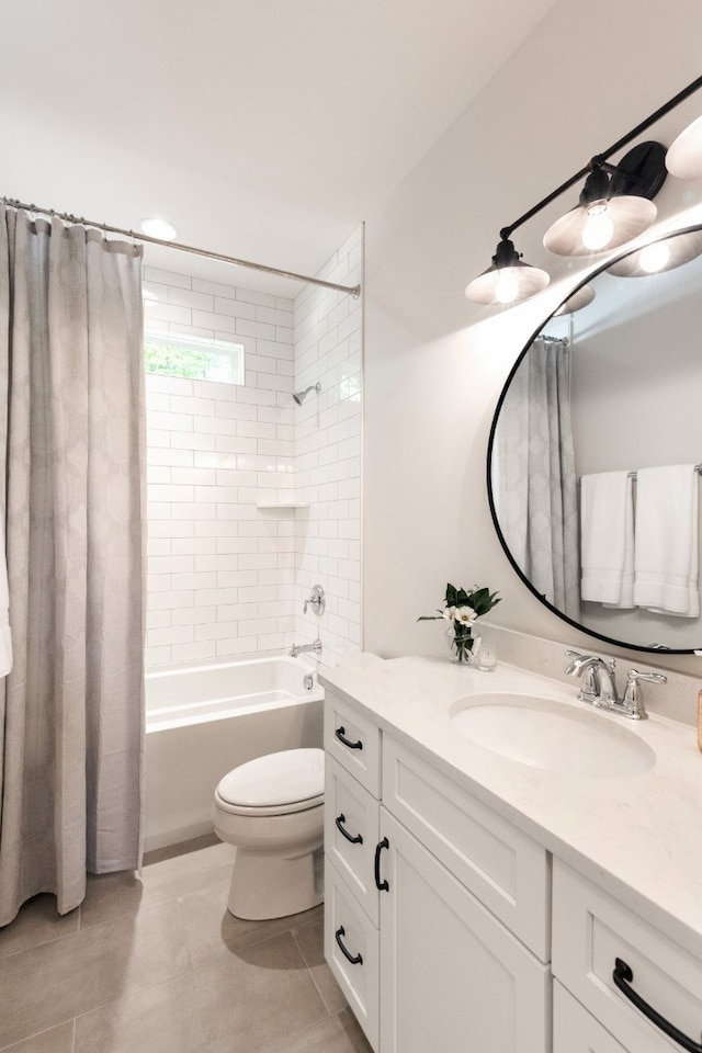 full bathroom with toilet, vanity, tile patterned floors, and shower / bath combo with shower curtain