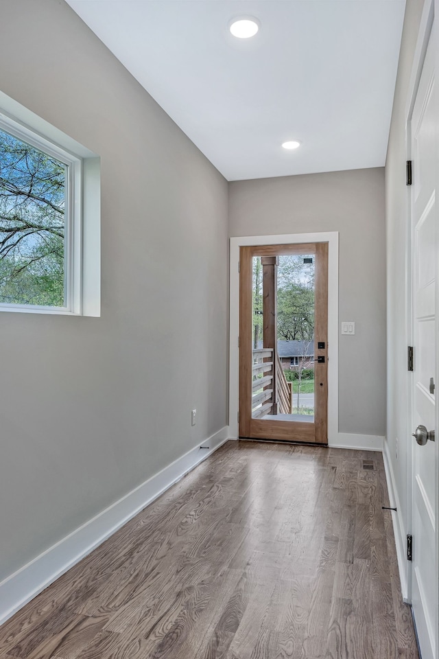 doorway with light hardwood / wood-style floors