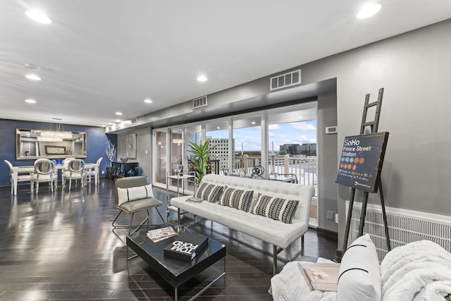 living room with dark hardwood / wood-style floors