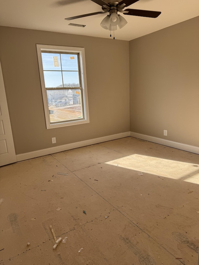 unfurnished room with ceiling fan