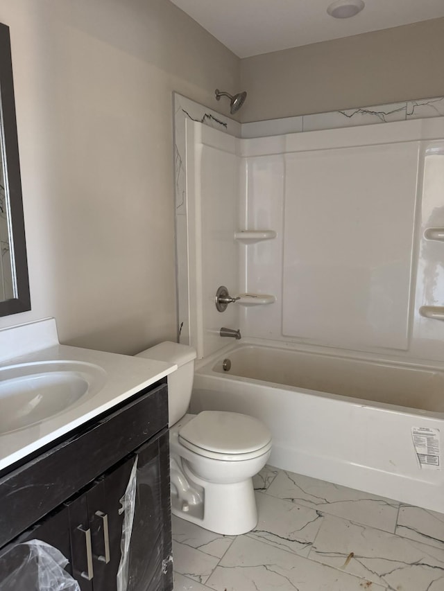 full bathroom featuring vanity, toilet, and washtub / shower combination