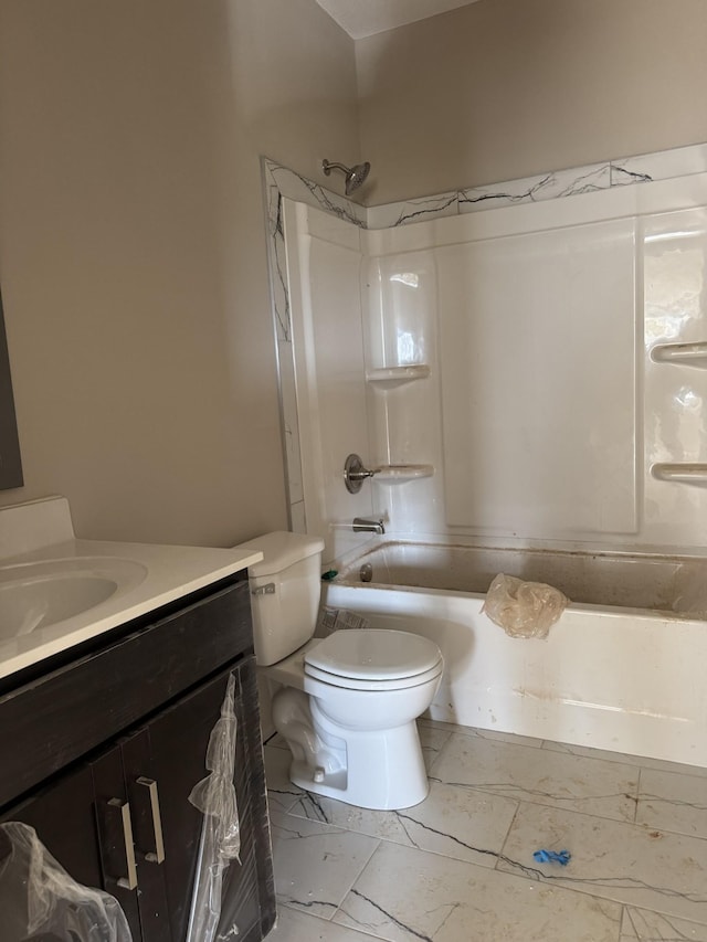 full bathroom featuring shower / washtub combination, toilet, and vanity