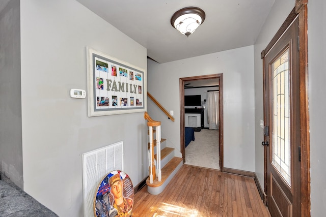 interior space with hardwood / wood-style floors