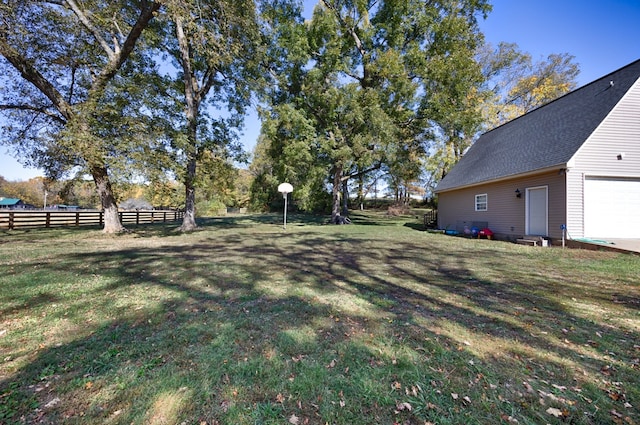 view of yard with a garage