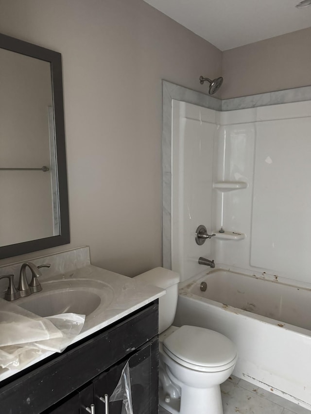 full bathroom featuring shower / bath combination, vanity, and toilet