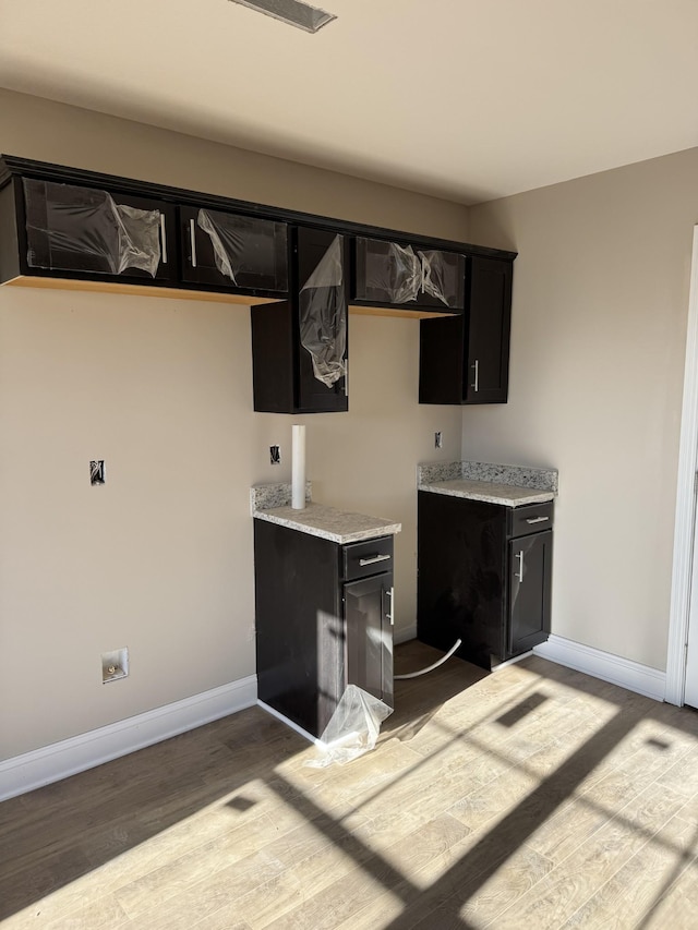 kitchen with light wood-type flooring