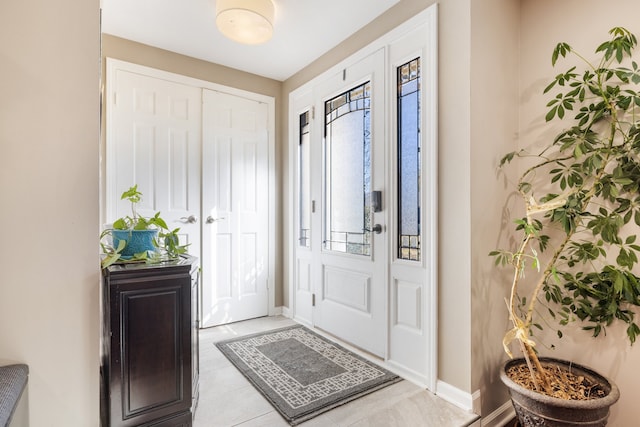 view of tiled foyer entrance