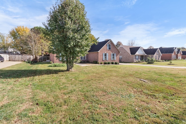 view of front of home with a front yard