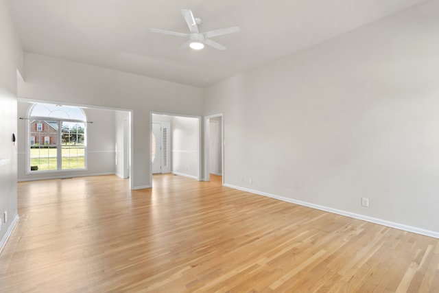 spare room featuring ceiling fan and light hardwood / wood-style flooring