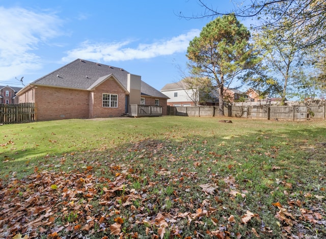 view of yard featuring a deck