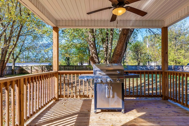 wooden terrace featuring ceiling fan