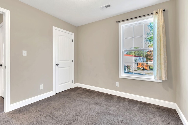 view of carpeted spare room