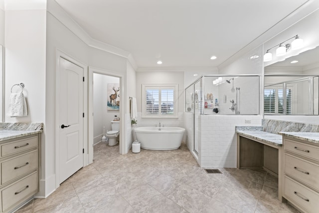 full bathroom featuring shower with separate bathtub, toilet, ornamental molding, vanity, and tile patterned flooring