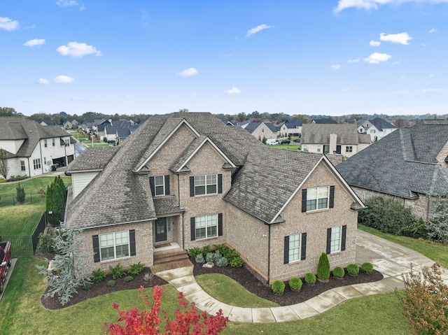 view of front of home featuring a front lawn