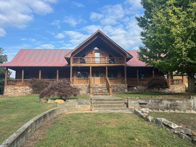 log home featuring a front yard