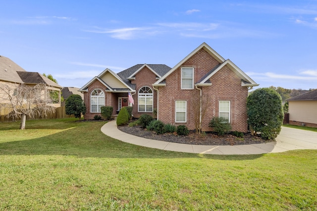 front facade featuring a front yard