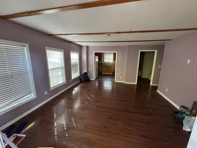 spare room featuring dark hardwood / wood-style floors