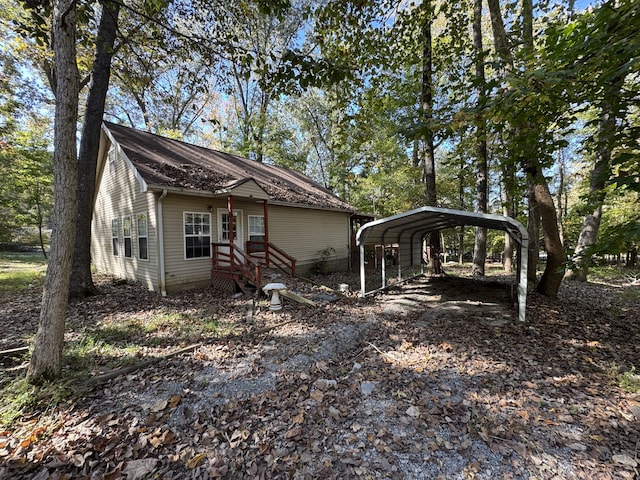 exterior space with a carport