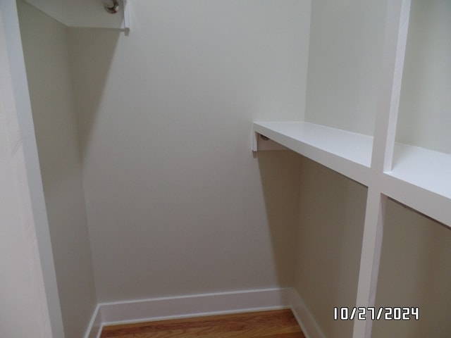 walk in closet featuring wood-type flooring