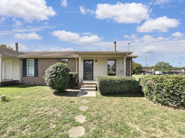 view of front facade with a front yard