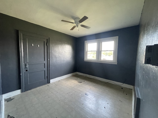 interior space featuring ceiling fan