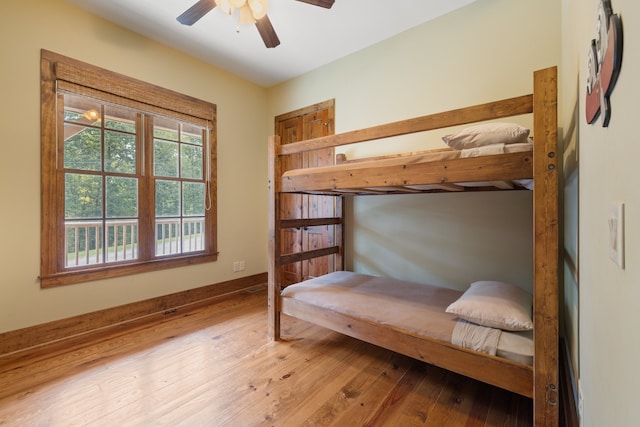 bedroom featuring ceiling fan and hardwood / wood-style floors