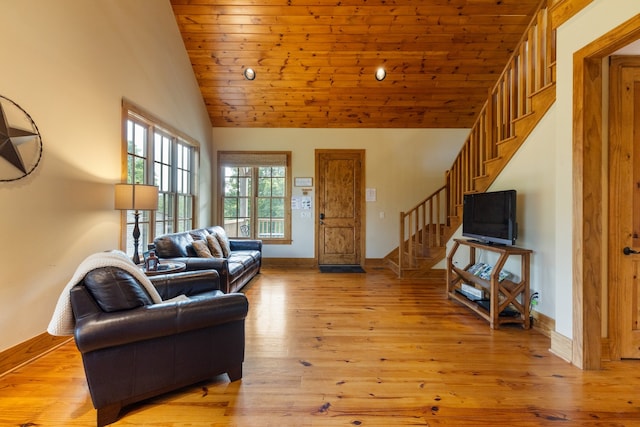 living room featuring wood ceiling, high vaulted ceiling, and light hardwood / wood-style flooring