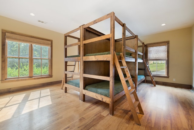 bedroom with light hardwood / wood-style floors