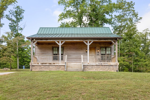 view of front of house with a porch and a front yard