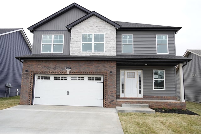 view of front facade with concrete driveway, brick siding, board and batten siding, and an attached garage