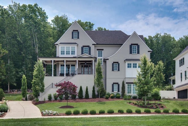 view of front of home with a front lawn