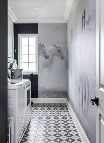 clothes washing area featuring ornamental molding and independent washer and dryer