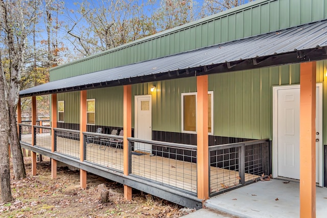 view of property exterior with an outdoor structure