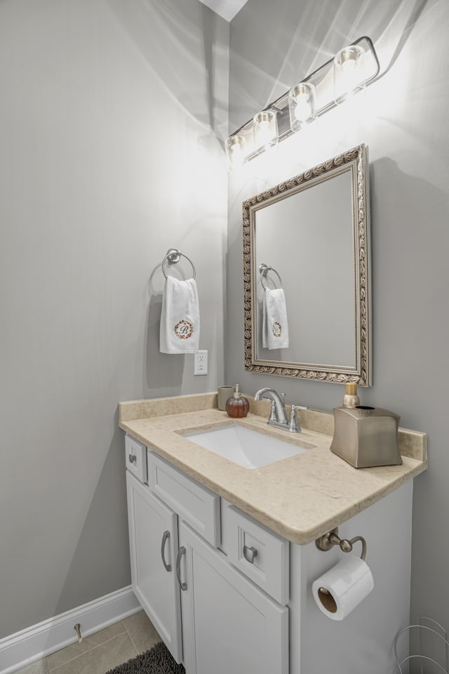 bathroom with vanity and tile patterned floors