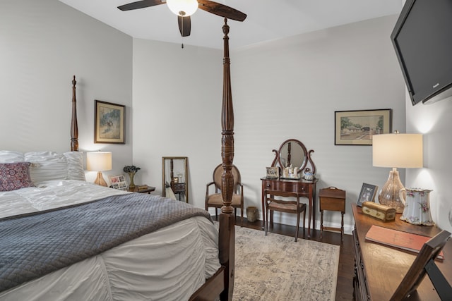 bedroom featuring hardwood / wood-style floors and ceiling fan