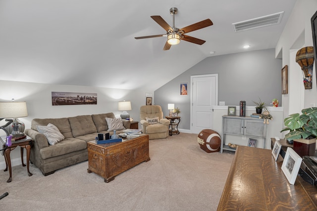 living room featuring vaulted ceiling, ceiling fan, and carpet floors