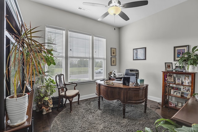 office area featuring dark hardwood / wood-style flooring and ceiling fan